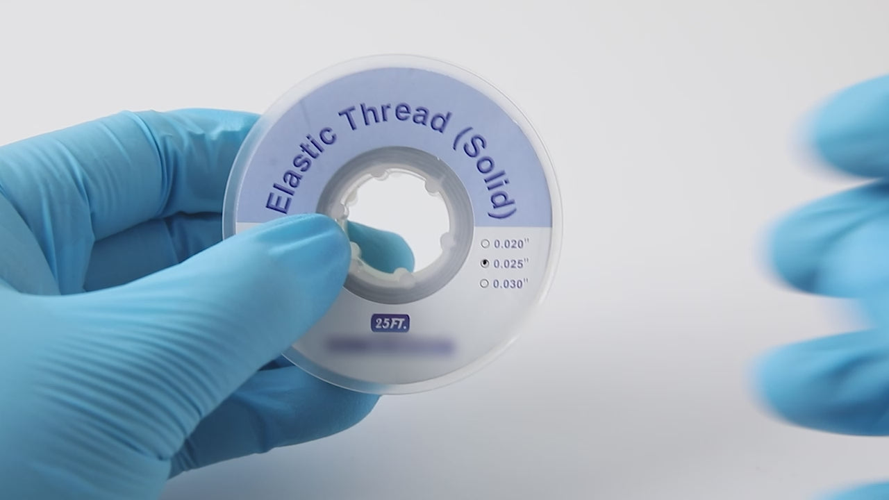 Load video: Dental Ortho Elastic Thread Traction Ligature Power Tube Orthodontic Solid 0.020/0.025/0.030